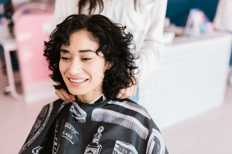 Happy salon client smiling after service